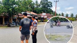 Petugas Satlantas Polres Padang Pariaman melakukan olah TKP di lokasi kecelakaan tabrak lari di Jalan Pariaman–Lubuk Alung, Simpang Empat Toboh Baru.