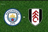 Logo Manchester City dan Fulham jelang pertandingan Liga Inggris di Etihad Stadium.