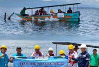 Bupati Monadi bersama PT Kerinci Merangin Hidro saat melakukan penebaran ikan endemik di Danau Kerinci,