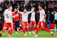 Fran Beltrán merayakan gol kontroversial saat Girona menghadapi Barcelona di LaLiga.