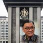 Gedung Bank Indonesia di Jakarta dengan ilustrasi Kepala Departemen Komunikasi BI Ramdan Denny Prakoso terkait percepatan jadwal tukar uang baru 2026 melalui aplikasi PINTAR.