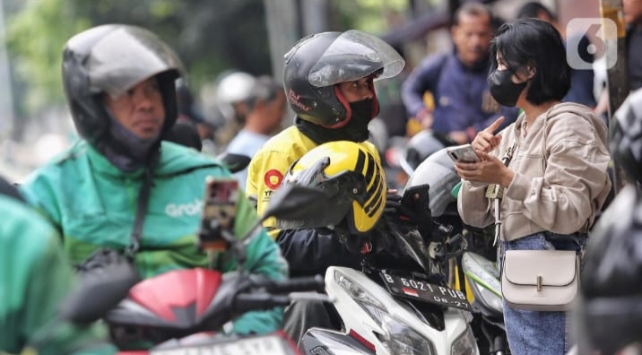 Driver ojol siap menerima THR menjelang Idul Fitri 2026, sesuai kebijakan pemerintah