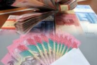 Ilustrasi pekerja menerima Tunjangan Hari Raya (THR) menjelang Idul Fitri 2026.