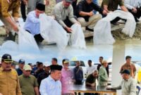 Bupati Kerinci Monadi mendampingi Gubernur Jambi Al Haris saat meninjau PLTA Kerinci dan menebar benih ikan di Sungai Batang Merao.