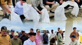 Bupati Kerinci Monadi mendampingi Gubernur Jambi Al Haris saat meninjau PLTA Kerinci dan menebar benih ikan di Sungai Batang Merao.