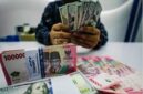 Ilustrasi pergerakan nilai tukar dolar Amerika Serikat terhadap rupiah di pasar keuangan.