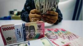 Ilustrasi pergerakan nilai tukar dolar Amerika Serikat terhadap rupiah di pasar keuangan.