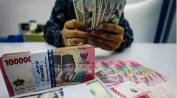 Ilustrasi pergerakan nilai tukar dolar Amerika Serikat terhadap rupiah di pasar keuangan.
