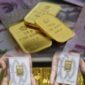 Ilustrasi logam mulia emas Antam dan UBS yang dijual di Pegadaian dengan harga terbaru 13 Maret 2026.