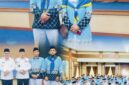 Pasangan suami istri Zaini Febriani dan Santi mengikuti prosesi pelepasan Jamaah Calon Haji Kota Sungai Penuh sebelum berangkat ke Tanah Suci bersama Kloter 23 Embarkasi Batam.