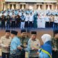 Wali Kota Sungai Penuh Alfin bersama Kemenhaj melepas 128 jamaah calon haji menuju Asrama Haji Jambi tahun 2026.