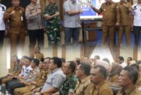 Wali Kota Sungai Penuh Alfin bersama Wakil Wali Kota Azhar Hamzah saat meresmikan sistem legalitas kotak amal berbasis QR Barcode bersama Densus 88 Antiteror Polri.