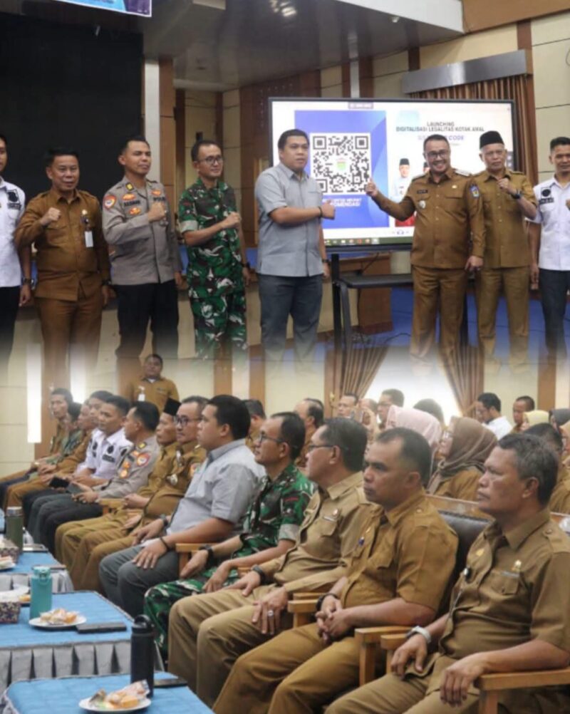 Wali Kota Sungai Penuh Alfin bersama Wakil Wali Kota Azhar Hamzah saat meresmikan sistem legalitas kotak amal berbasis QR Barcode bersama Densus 88 Antiteror Polri.