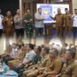 Wali Kota Sungai Penuh Alfin bersama Wakil Wali Kota Azhar Hamzah saat meresmikan sistem legalitas kotak amal berbasis QR Barcode bersama Densus 88 Antiteror Polri.