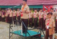 Sekda Kota Sungai Penuh Alpian saat membuka Jambore Cabang Gerakan Pramuka Kota Sungai Penuh Tahun 2026 di Bumi Perkemahan SMKN 4 Sungai Penuh