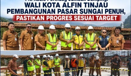 Plt. Kadis Perindag Jumadil mendampingi Wali Kota Alfin meninjau pembangunan Pasar Sungai Penuh