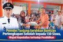 Kepala Desa Tanjung Andi Supriadi menyerahkan bantuan perlengkapan sekolah kepada siswa dan siswi Desa Tanjung di Aula Kantor Desa Tanjung