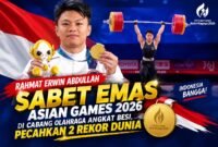 Rahmat Erwin Abdullah meraih medali emas cabang olahraga angkat besi Asian Games 2026 sekaligus mencatatkan dua rekor dunia.