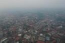 Kabut asap menyelimuti sejumlah wilayah di Provinsi Jambi di tengah penanganan karhutla.