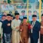 Wali Kota Sungai Penuh Alfin, S.H., bersama Ketua TP-PKK Kota Sungai Penuh Ny. Sri Kartini Alfin, S.Kep., Ns., menghadiri Rapat Paripurna DPRD dalam rangka memperingati HUT ke-27 Kabupaten Sarolangun di Kantor DPRD Kabupaten Sarolangun, 